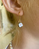 WHITE CERAMIC FLORAL EARRINGS WITH CHAMPANGE PINK